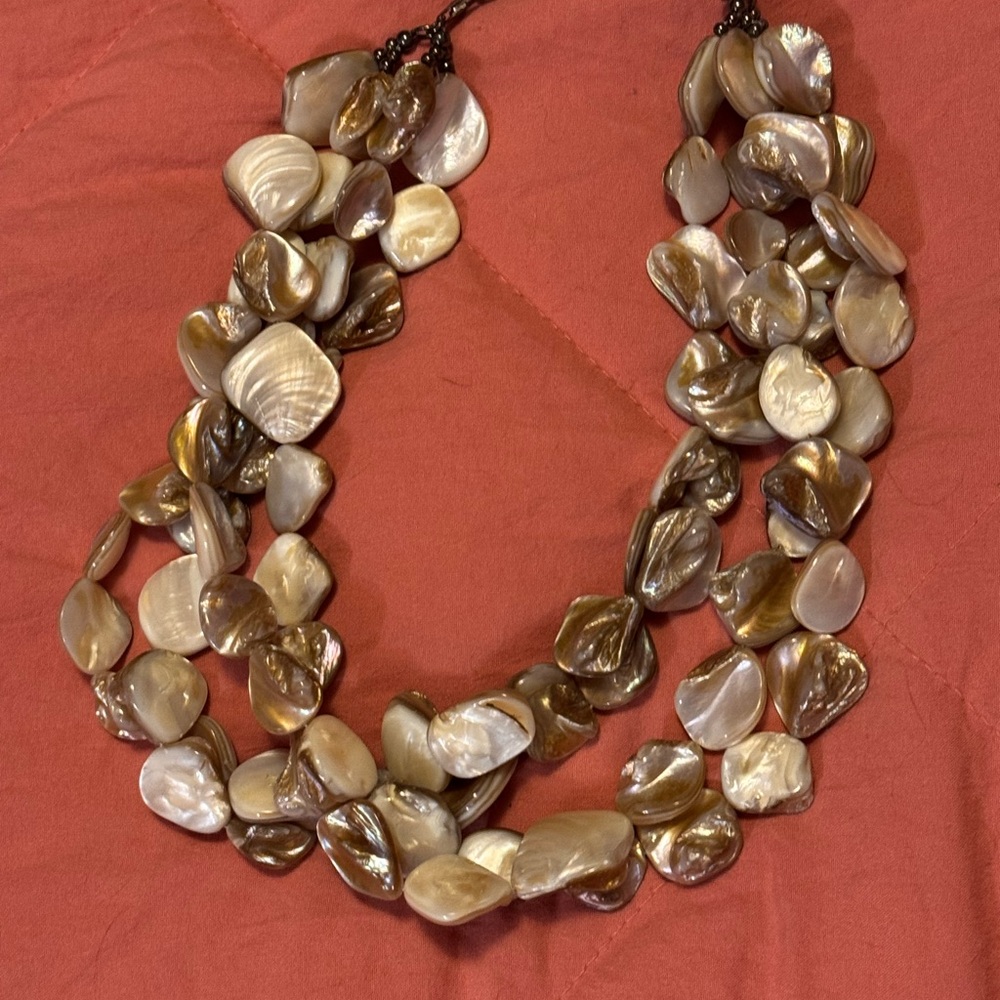 Elegant Mother of Pearl Vintage Shell Necklace in Natural Tones. 16-18”
4 Strand